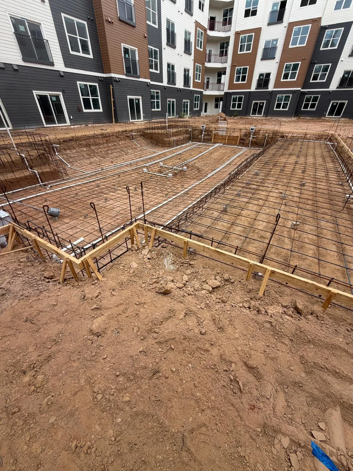 Concrete construction by Terregal Holdings in Greater Houston: rebar and formwork, foundations, slabs and paving for commercial and multifamily projects.